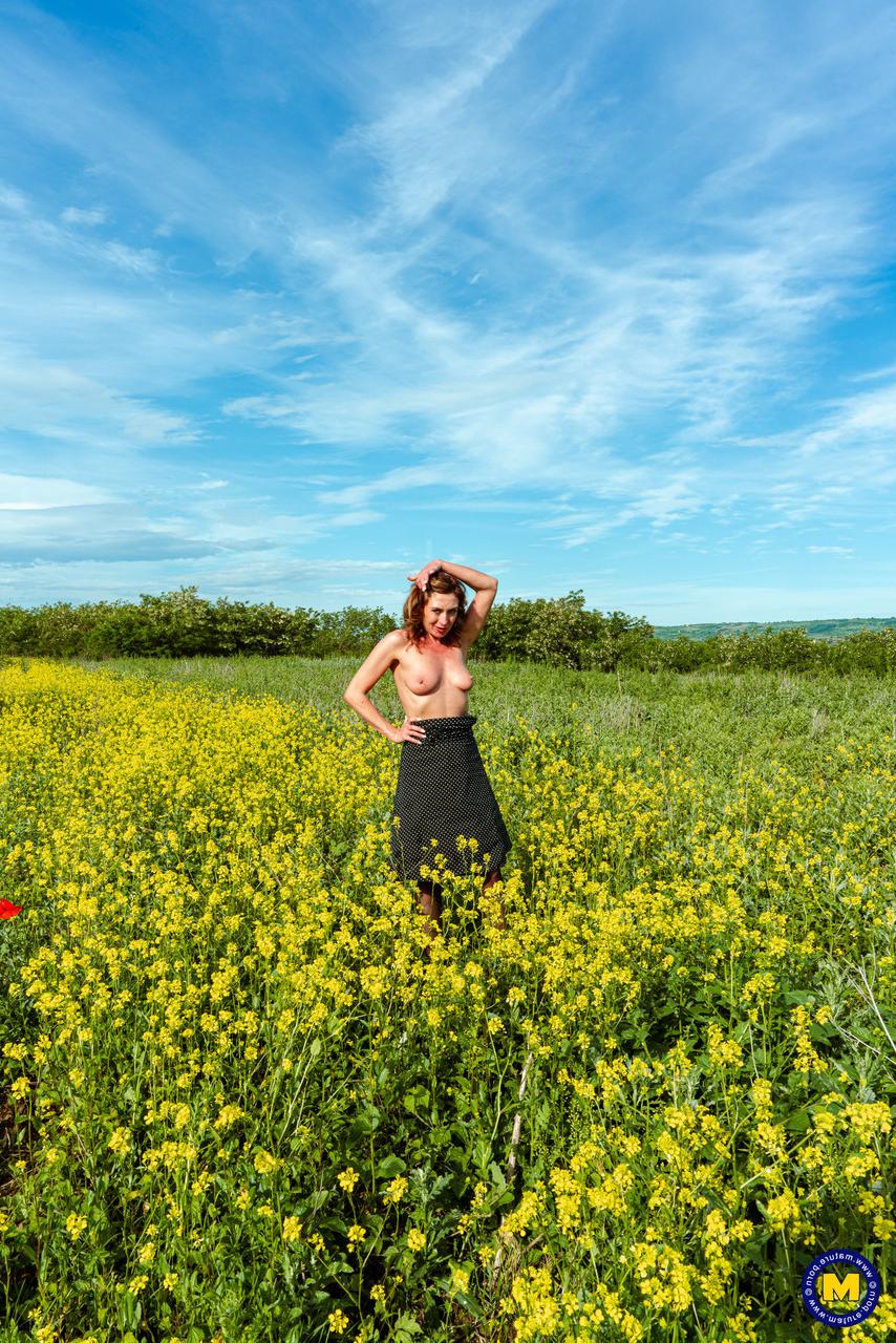 20P Ukrainian MILF Julia North shows off her natural tits & her big ass outdoors