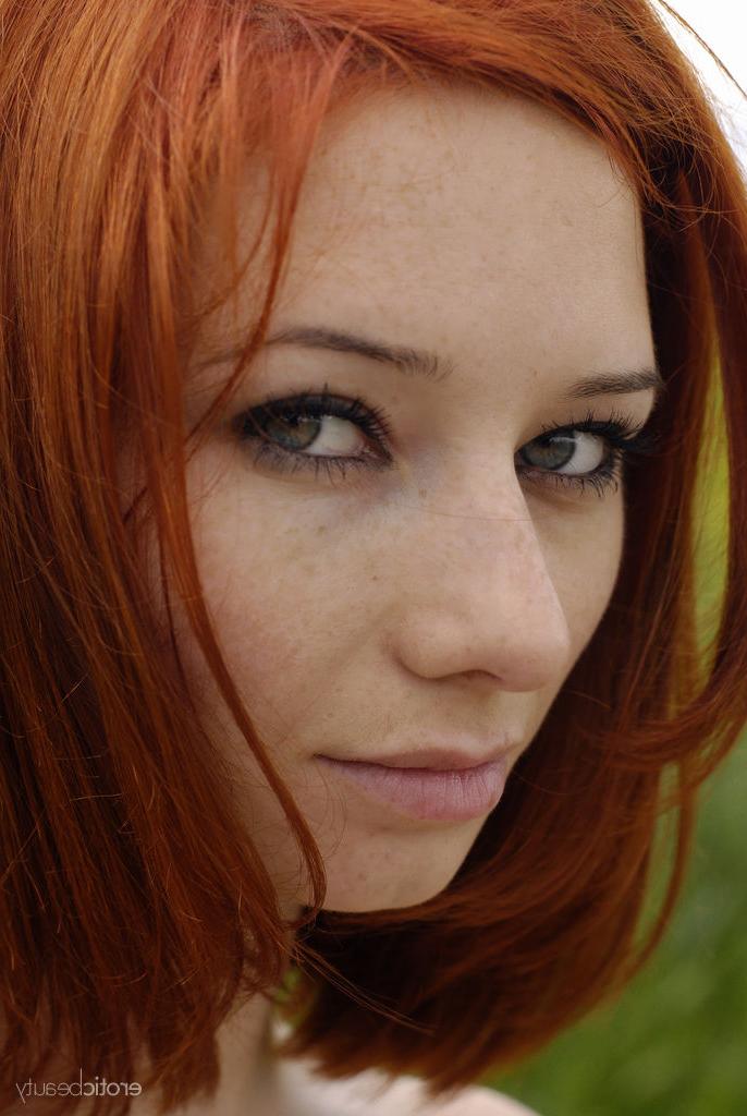 16P Redheaded teen Elis B models totally naked in front of a field of crops