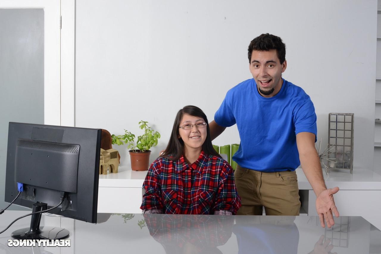 16P Petite Asian babe gets caught by her stepbrother watching porn on the PC
