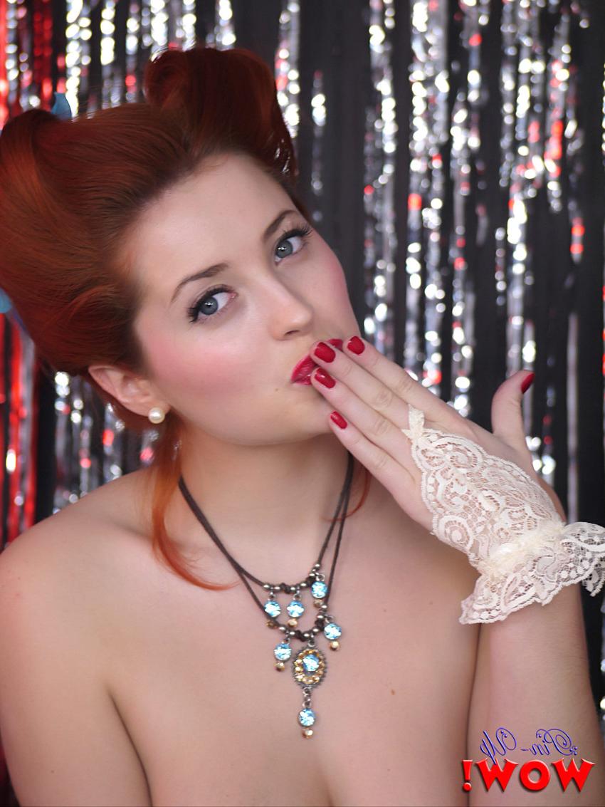 17P Gorgeous pinup model Lucy V strips burlesque style on a glittery stage