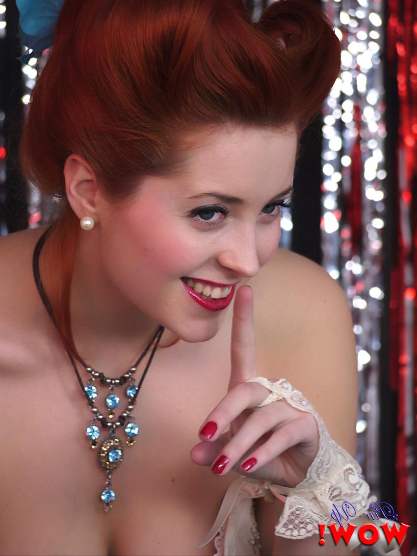 17P Gorgeous pinup model Lucy V strips burlesque style on a glittery stage
