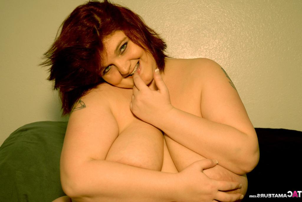 20P Obese redhead Blackwidow models nude in a skimpy thong during solo action
