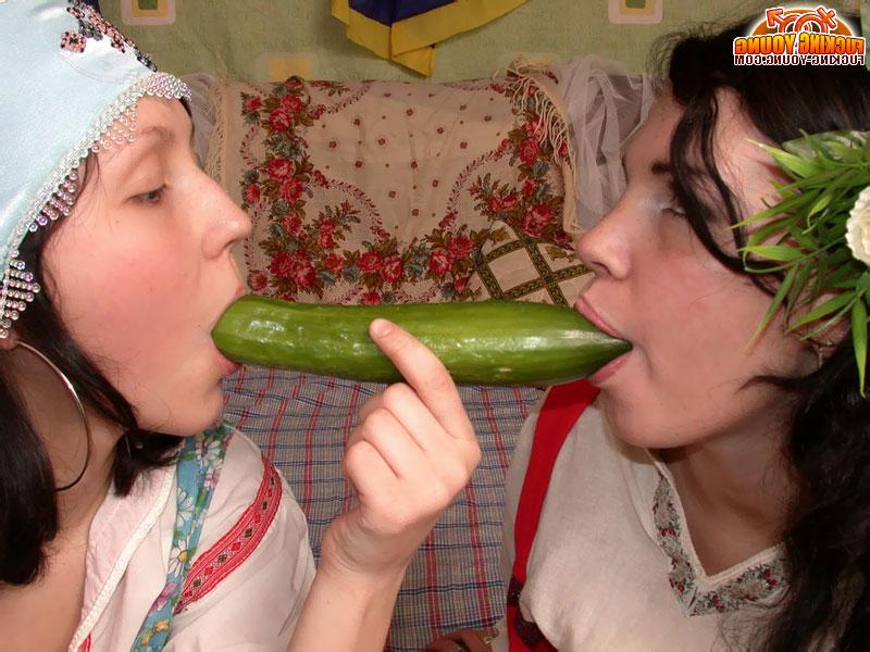20P Young lesbians insert bananas and cucumbers into their hairless pussies