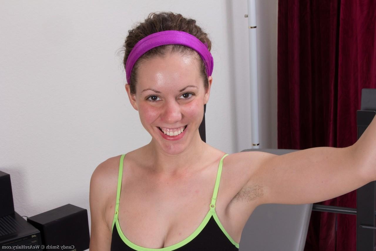 16P Caucasian girl Candy Smith displays her full bush while working out at home