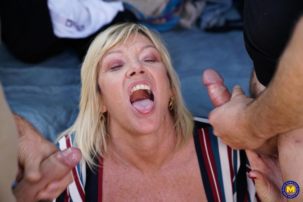 20P Sinful big boobed MILF Amy getting screwed in public by a bunch of men