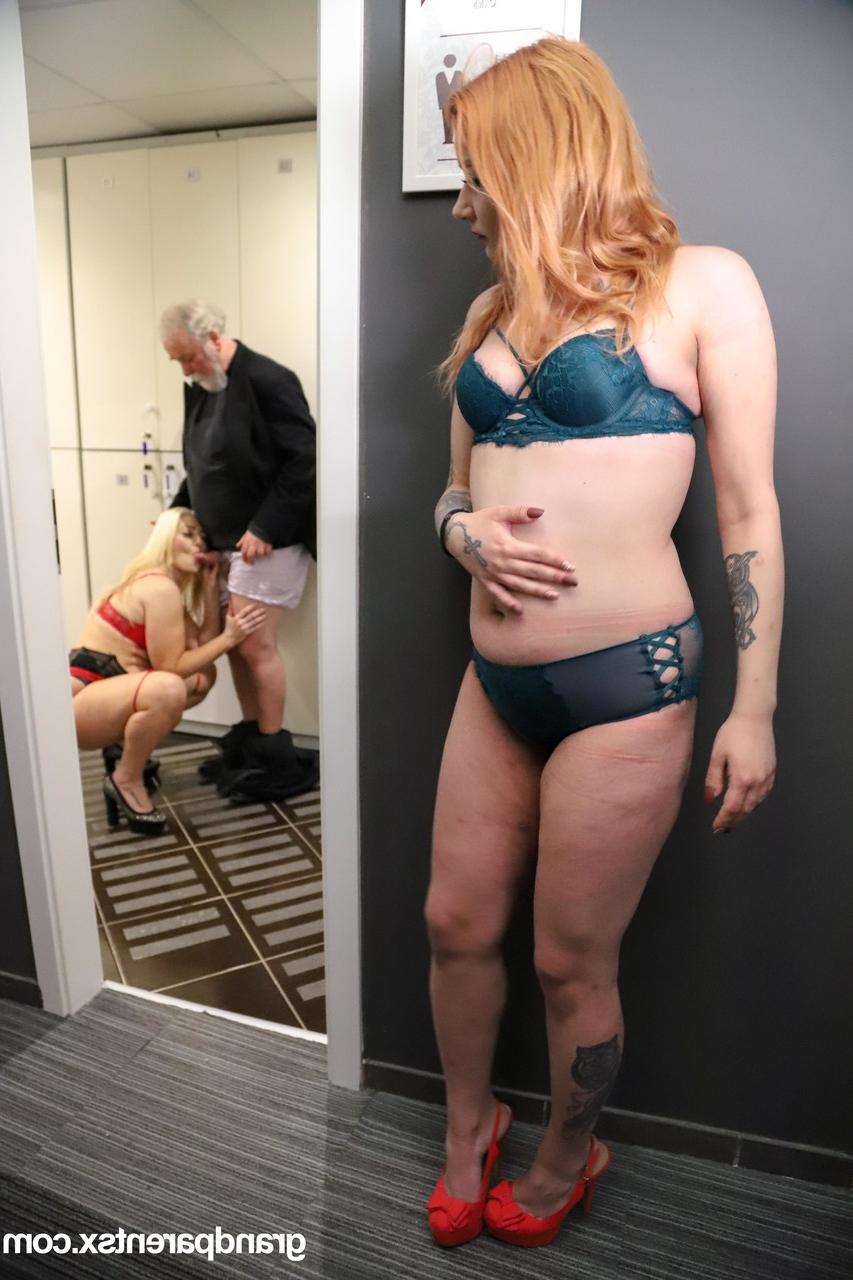20P Beautiful redhead Catherine Boss enjoys a steamy threesome with an old couple