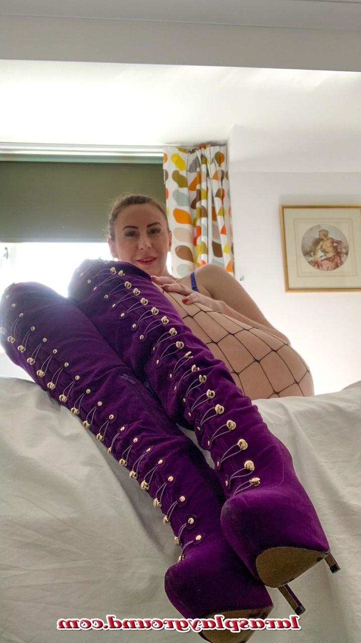 20P Ponytailed MILF Lara flaunts her big tits & ass in nylons & thigh-high boots