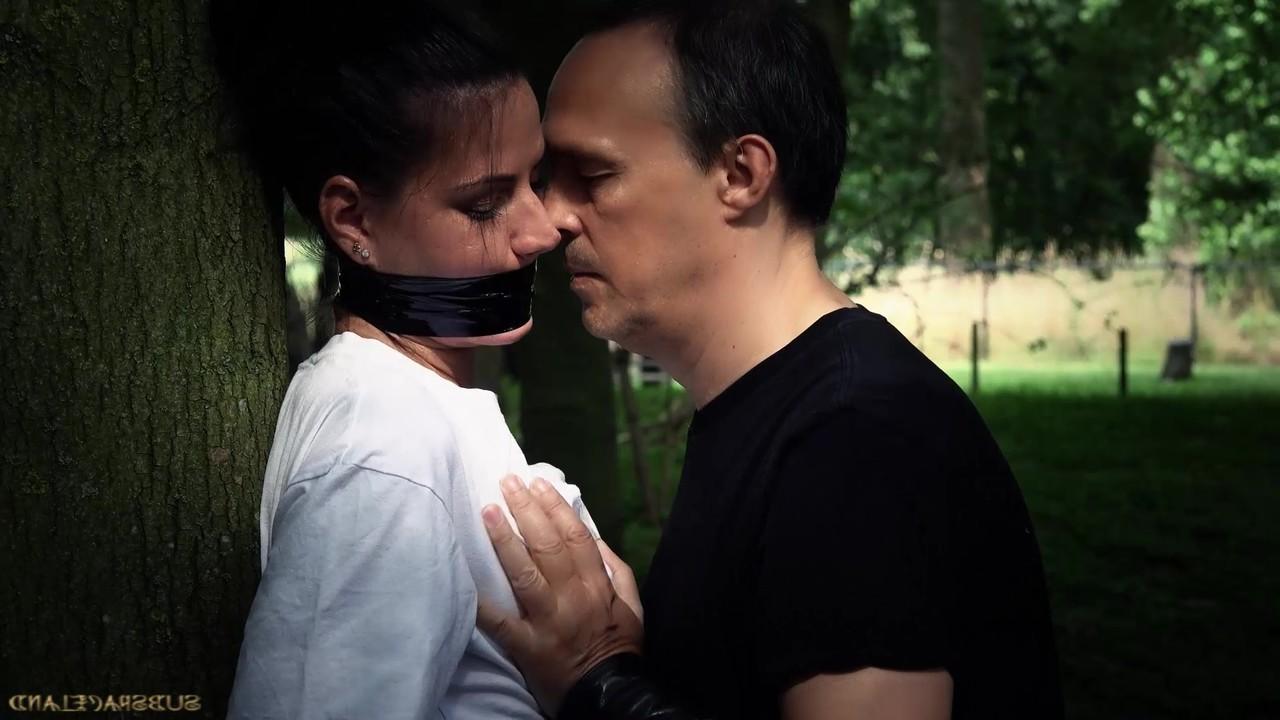 18P Brunette slave Athina tied to tree for outdoor spanking & deepthroat face fuck