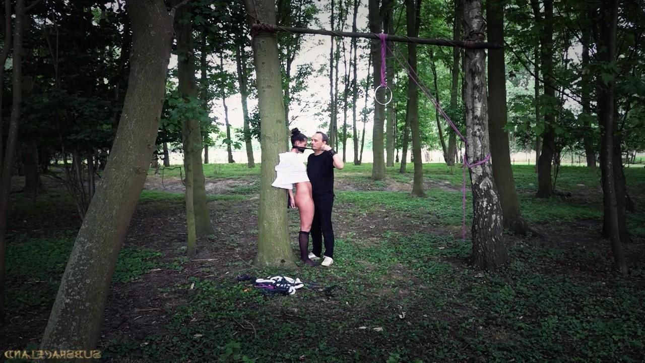 18P Brunette slave Athina tied to tree for outdoor spanking & deepthroat face fuck