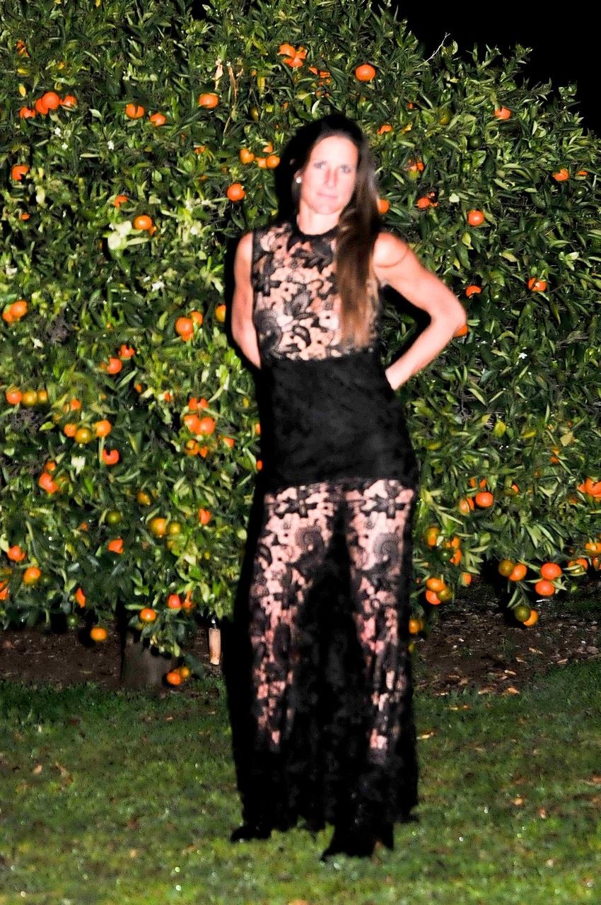 20P Brunette widow Sofie Marie flaunts her big ass while posing in her lace dress
