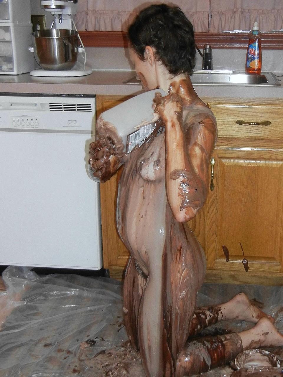 20P Kinky geek Shelly gets her naked body messy with hot chocolate in the kitchen