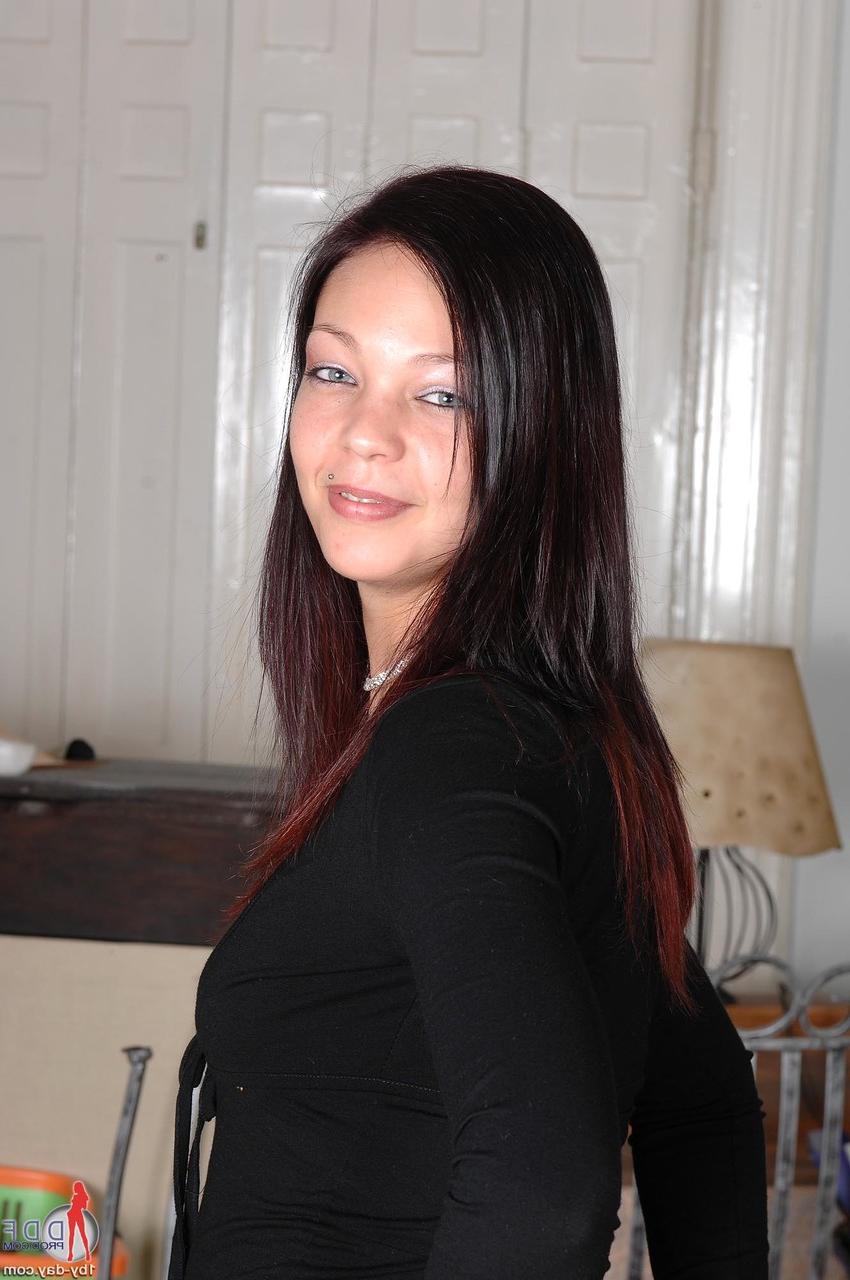 20P Pretty babe Donna Sting shows off her tiny tits in a sexy striptease