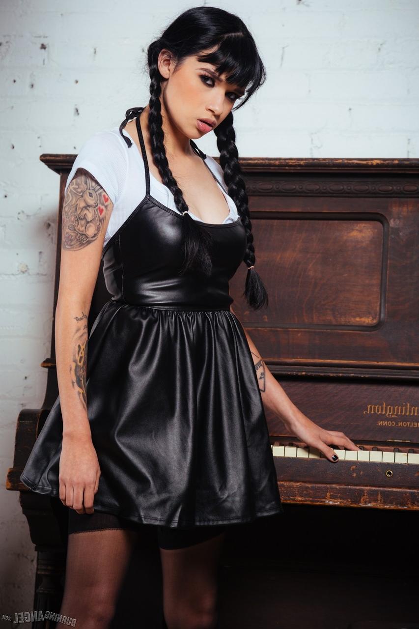 17P Busty pigtailed Judas sizzles as Wednesday Addams spreading ass on the piano