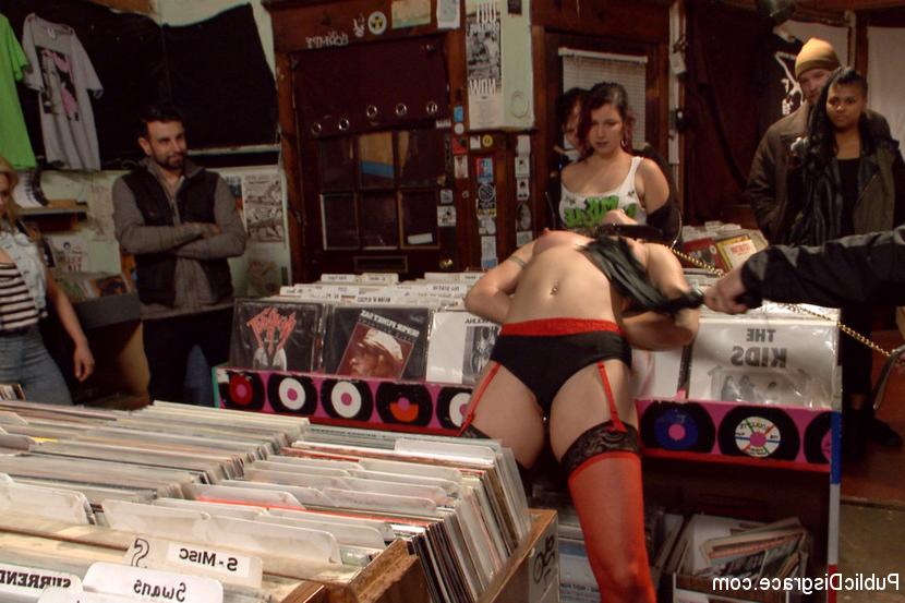 15P Female exhibitionist Wenona walks into a record shop for a gangbang