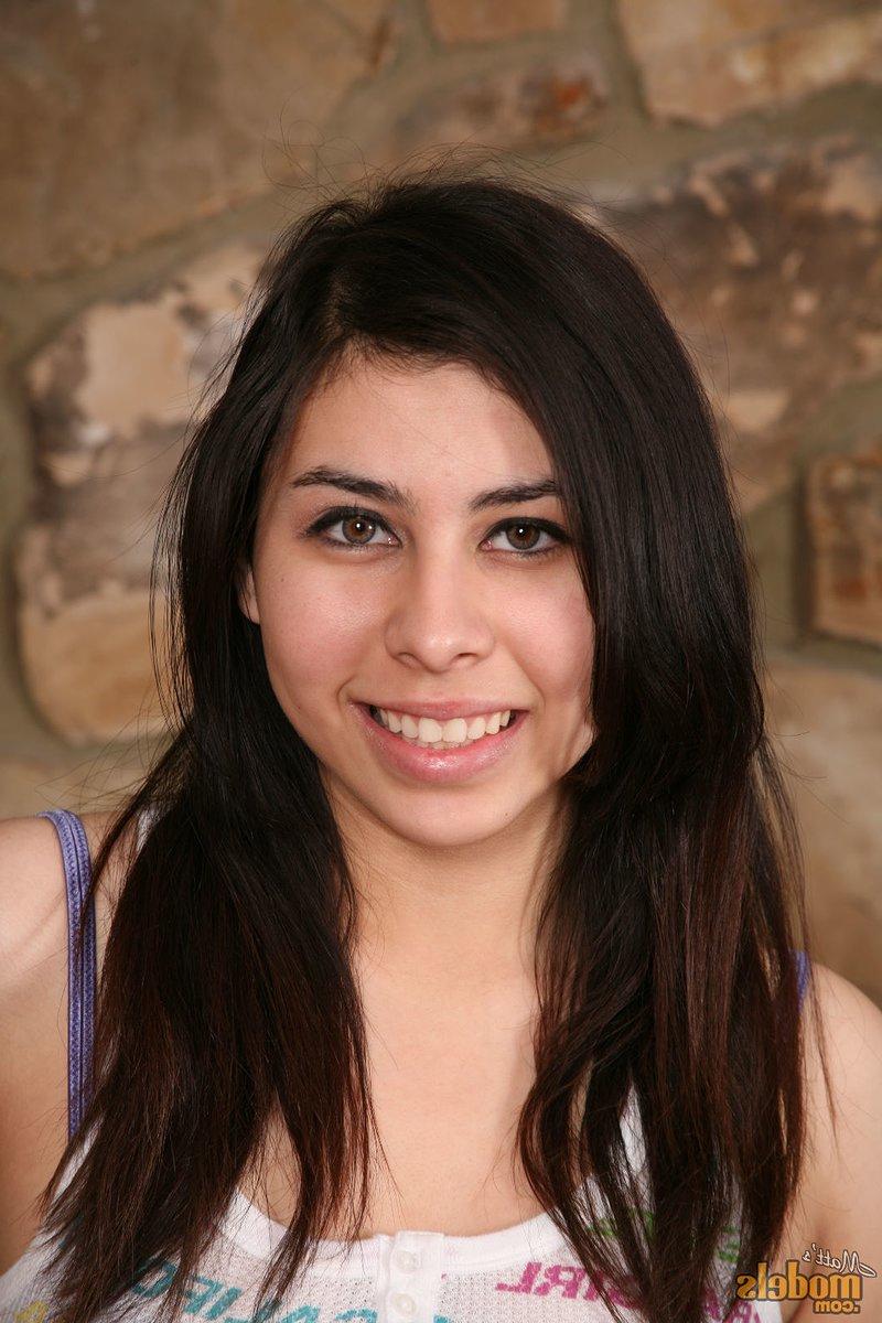 16P Brunette first timer Alexis Espinosa gets butt naked while on a futon