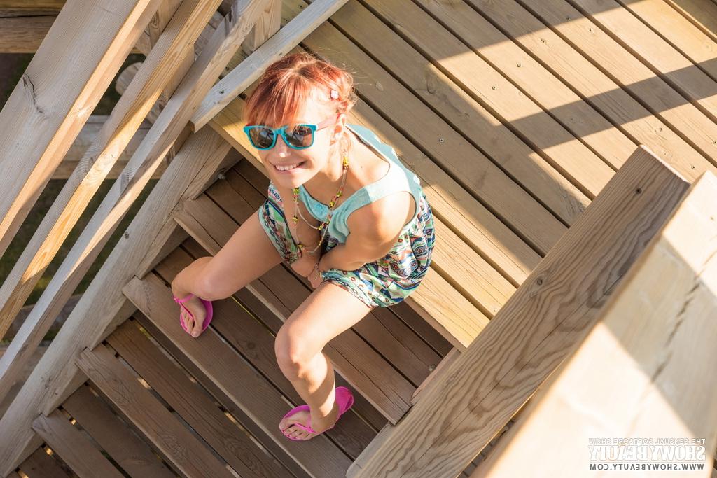 20P Cute redhead Angelina gets naked in sandals at a fire lookout tower