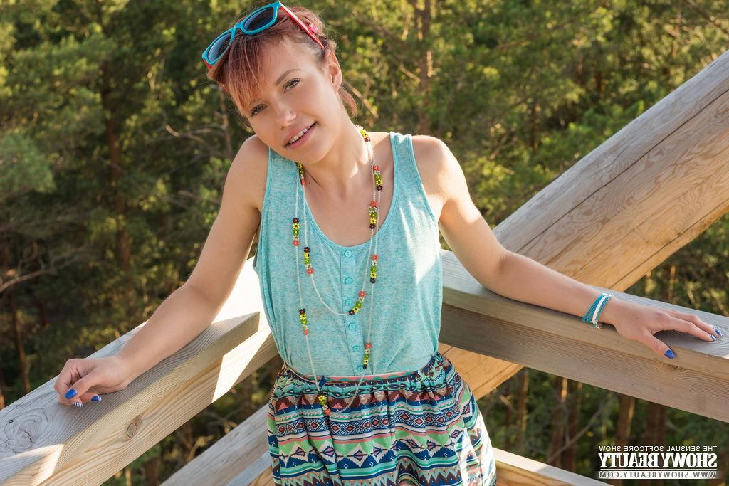 20P Cute redhead Angelina gets naked in sandals at a fire lookout tower