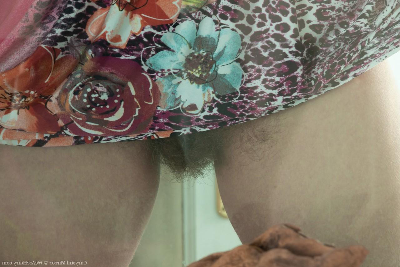 16P Busty amateur Chrystal Mirror slips a sex toy inside her really hair pussy