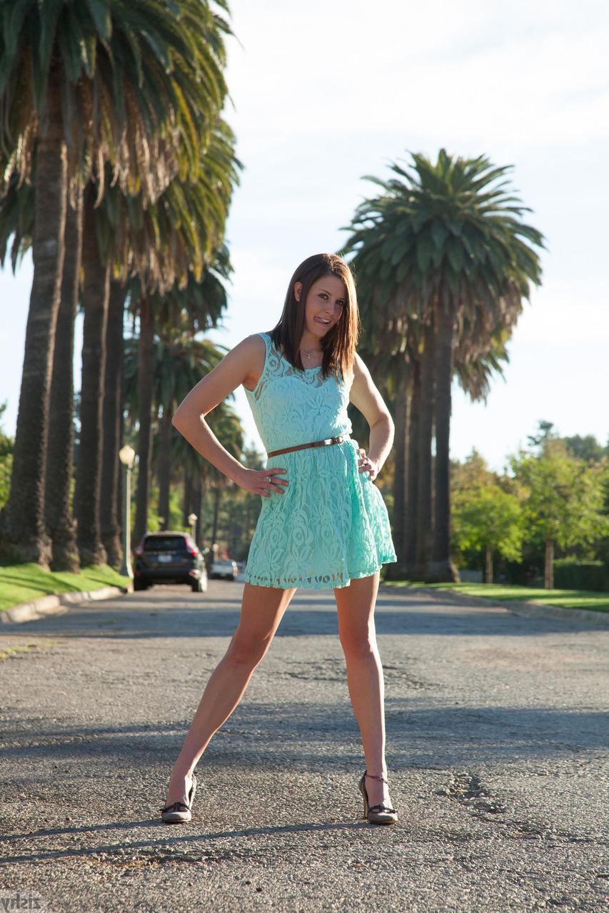 5P Beautiful teen Harmony Gaston flashes an upskirt in purple panties