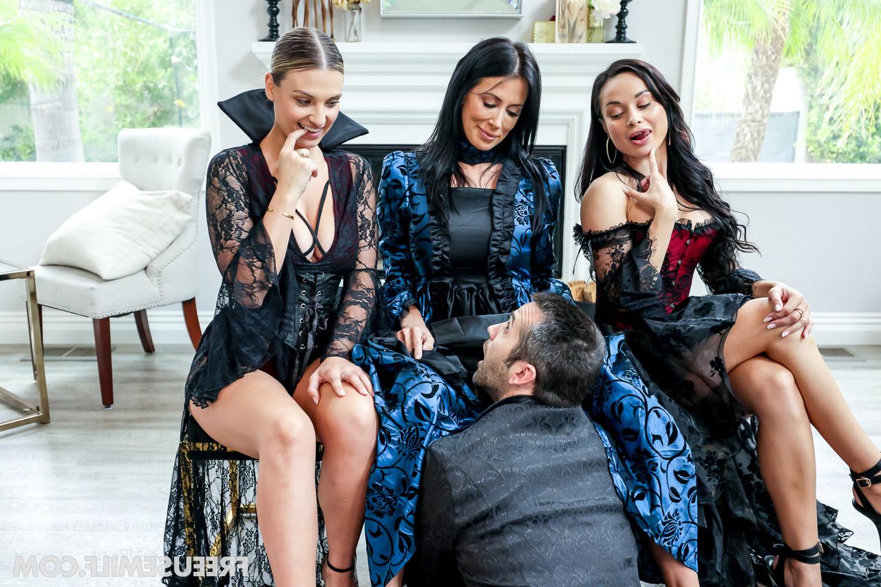 20P Stunning MILF Reagan Foxx and two pornstars share a dick in goth outfits