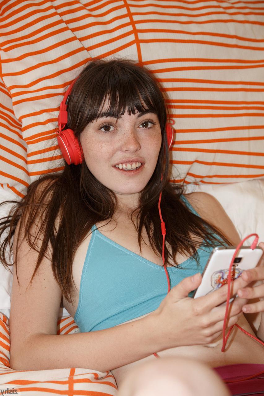 12P Nerdy girlfriend Debbie Vogel takes off her bra and panties to go naked