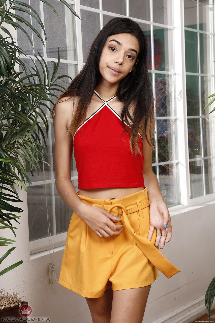 20P Raven-haired babe Harmony Wonder displays her big ass & holes up close