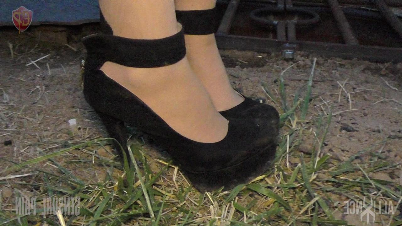 14P Female submissive Abigail Dupree is locked in a hole before being caned