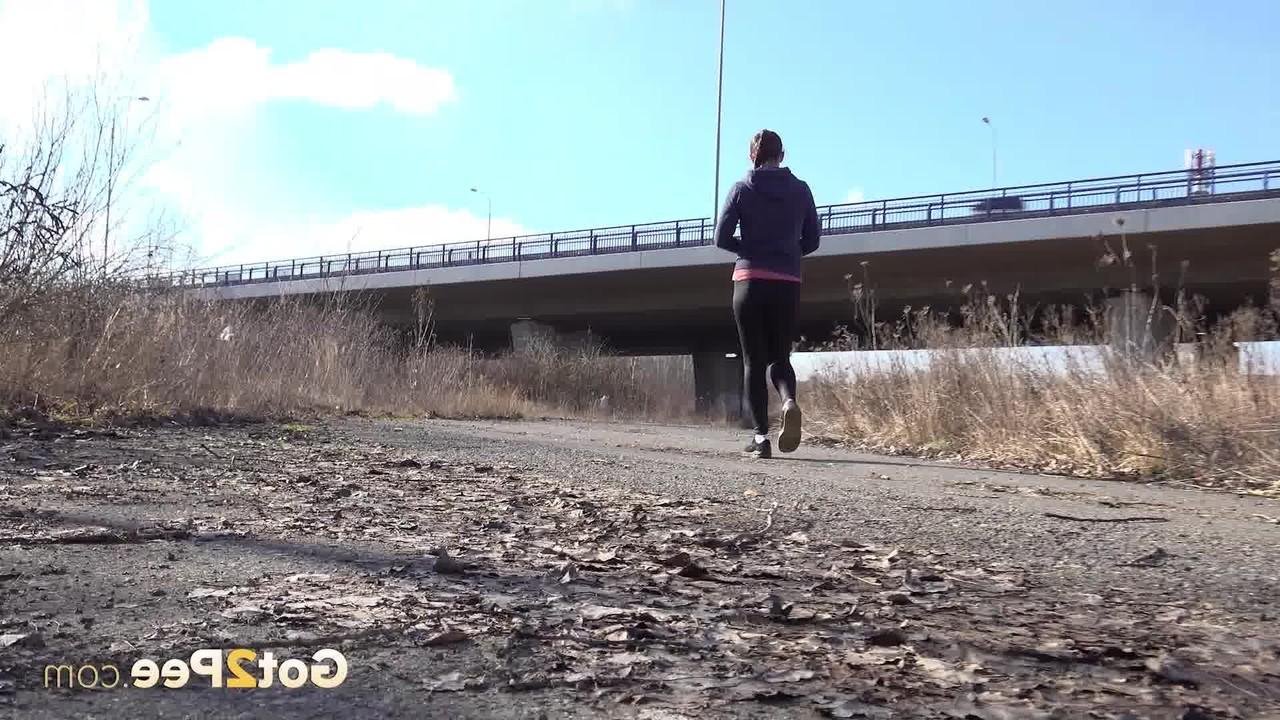 15P Valentina Ross pulls down her leggings to piss on a side road near an overpass