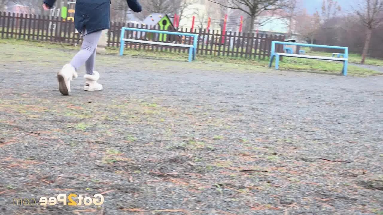 15P Blonde girl Victoria Pure pulls down her leggings to pee against a public tree