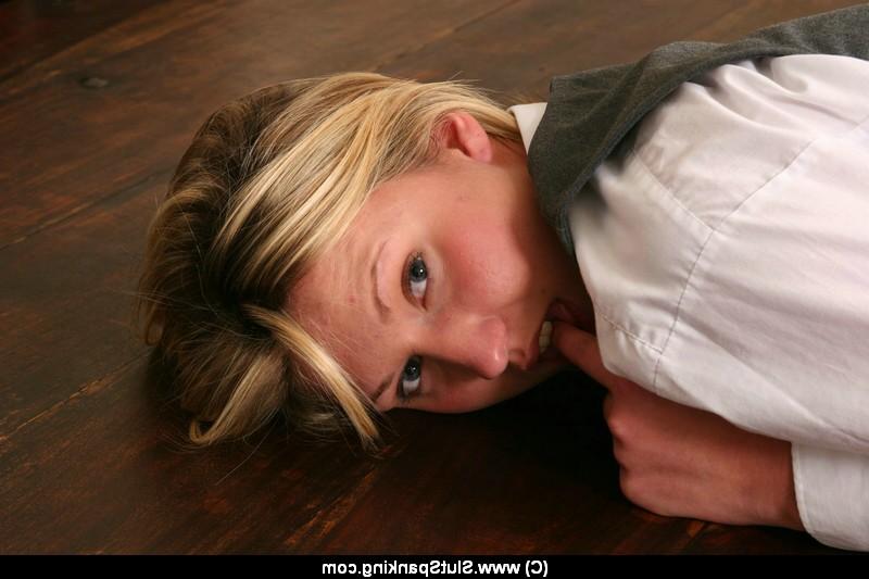 12P Blonde student bends over a desk for a brutal paddling from a headmistress