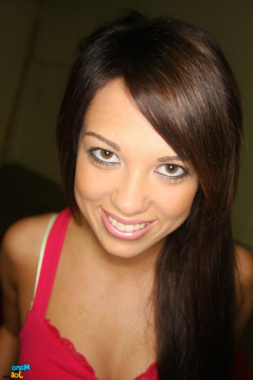 15P Brunette chick undresses before working a big cock with her hands