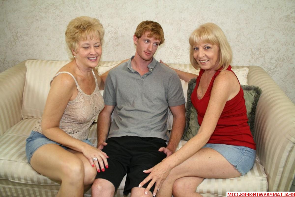 20P Blonde mature Tracy Lick and her swinger friend share a hot dick orally