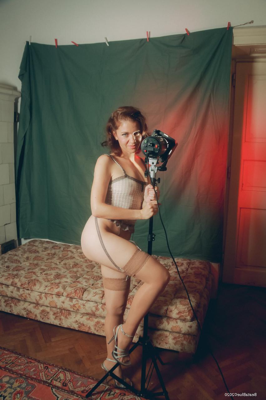 20P Alluring babe shows off her perfect booty wearing stockings and high heels