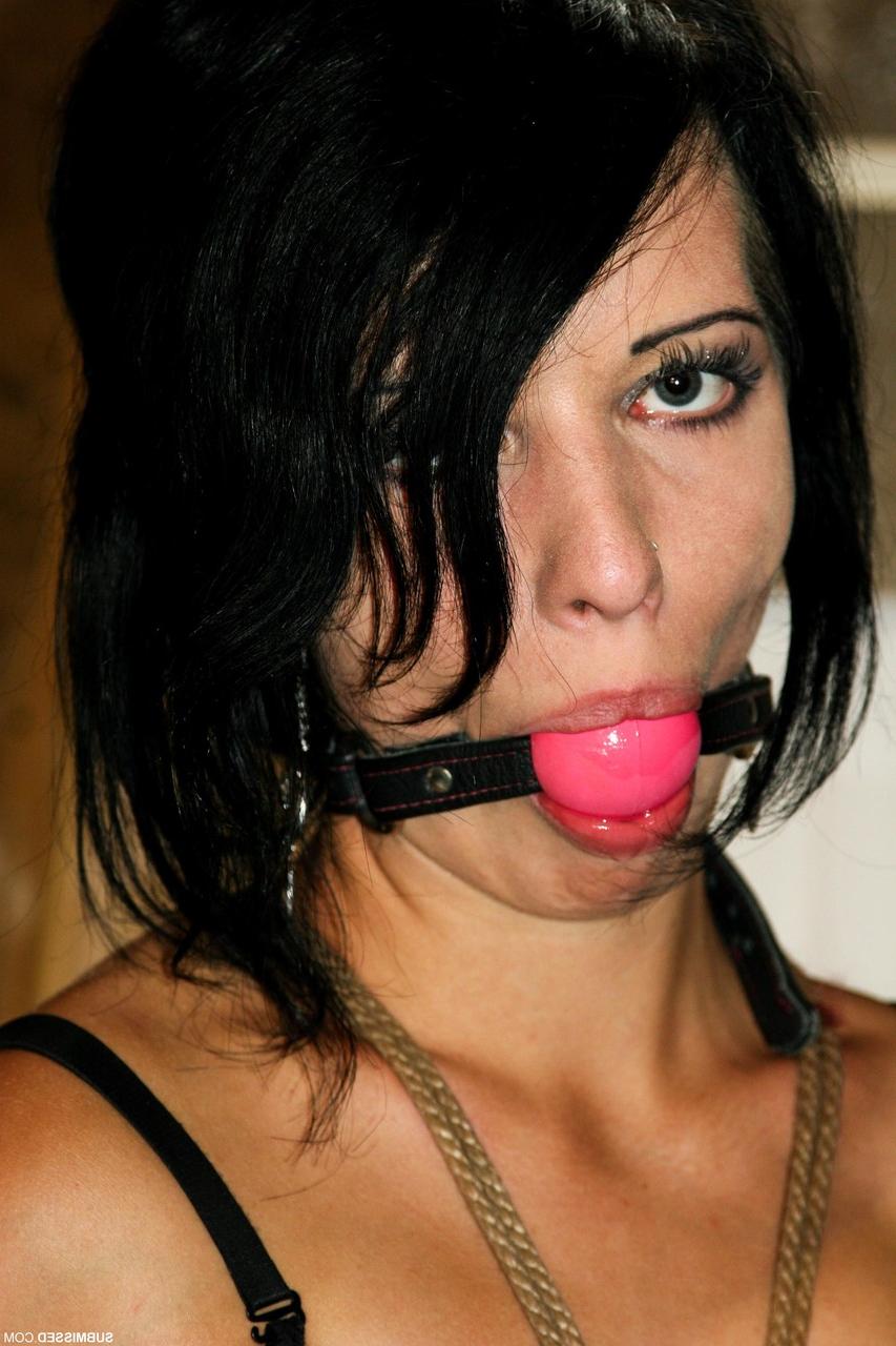 20P Helpless dark-haired MILF Lucy struggles gagged & bound in her bra & leggings