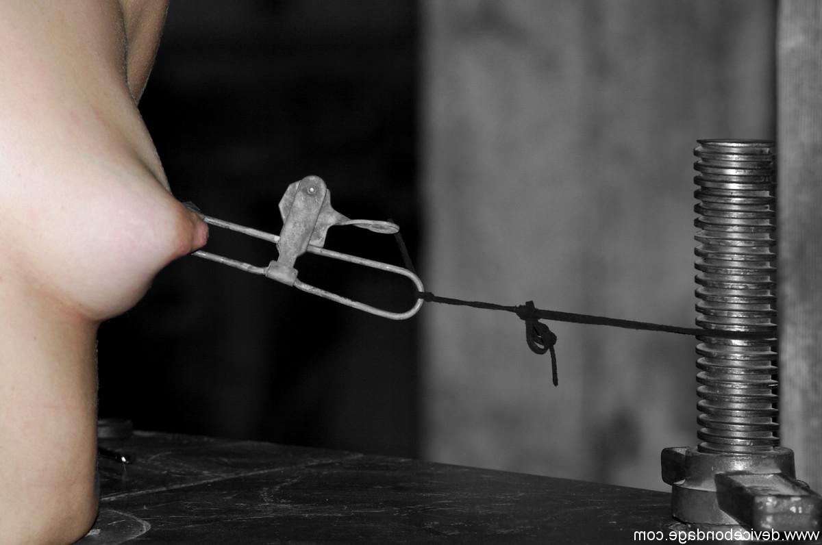 20P Submissive babes endure painful corporal punishment in metal bondage