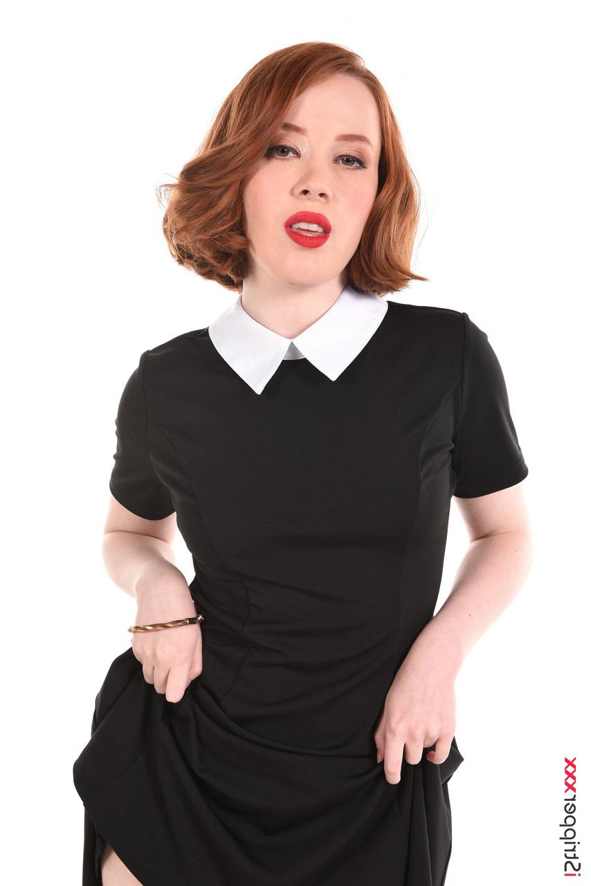 15P Natural redhead Lottie Magne licks a dildo while studying a chessboard