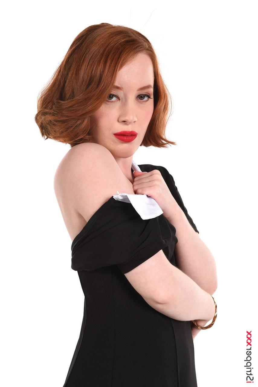 15P Natural redhead Lottie Magne licks a dildo while studying a chessboard