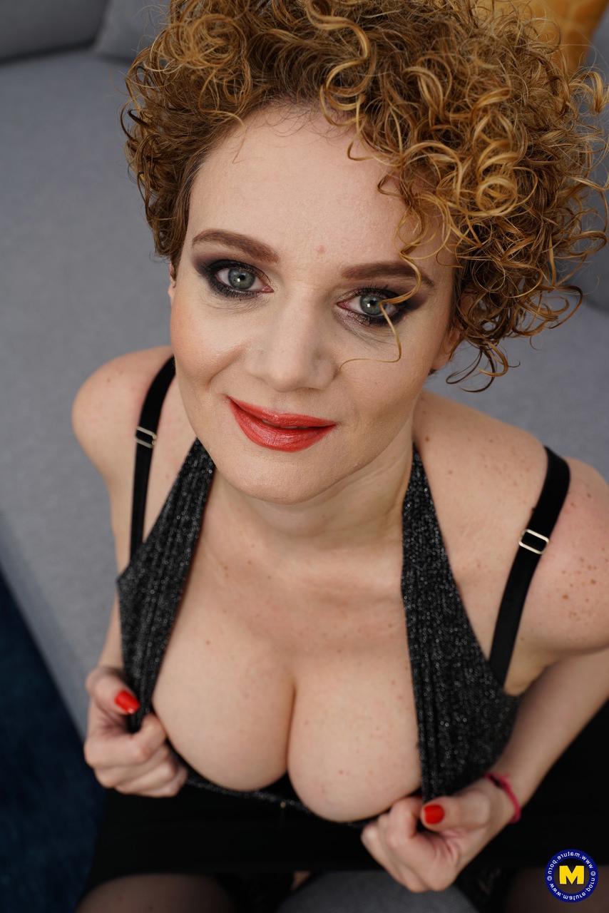 20P Mature bombshell Merce flaunts her juicy tits in a sexy black outfit