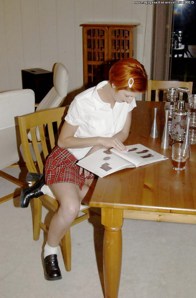 16P Close up posing of an schoolgirl Lydia West in her kitchen