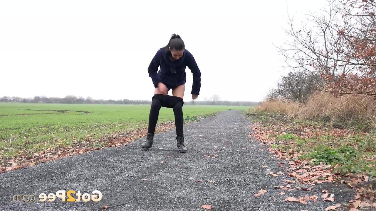 15P Caucasian girl Amanda Estelapisss on a path through an open field