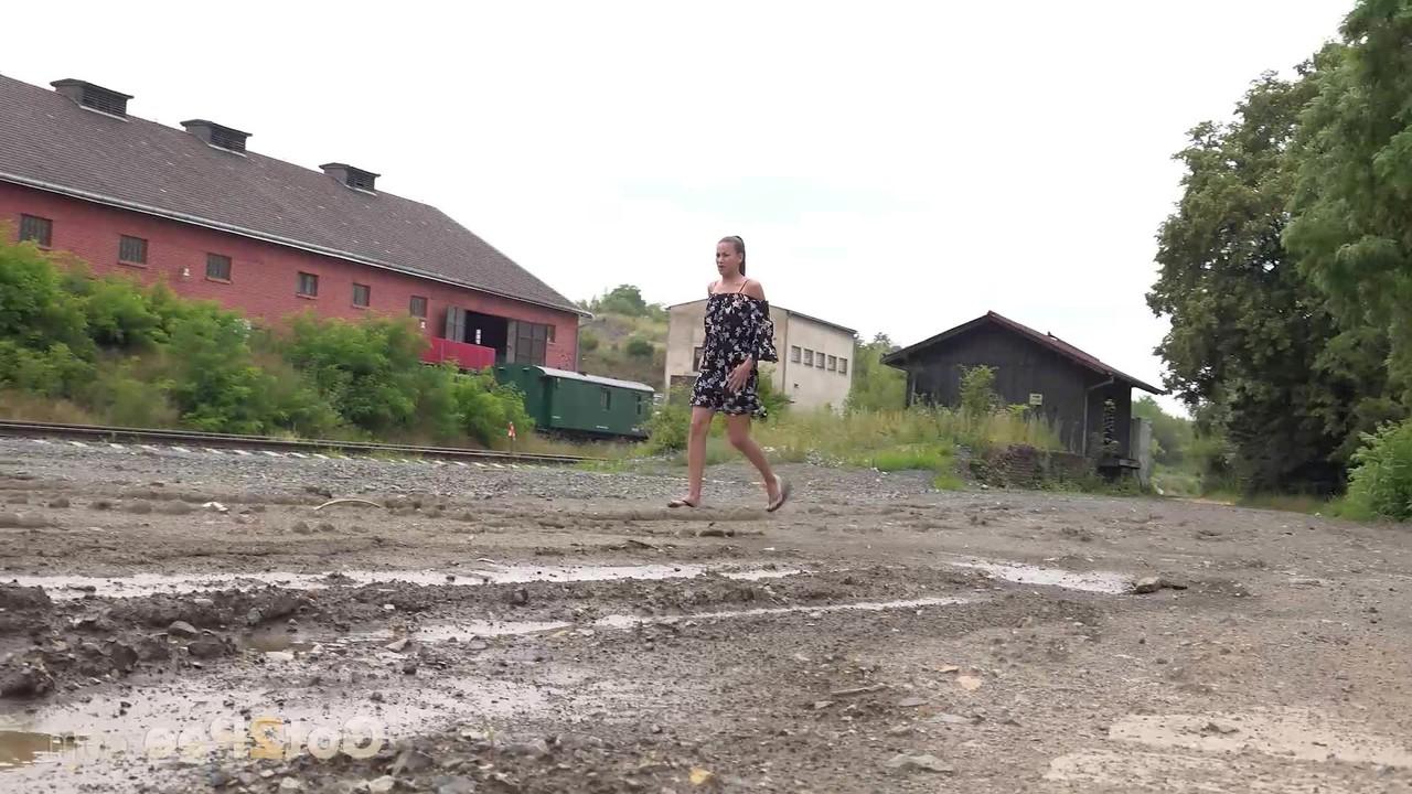 15P Yenna takes a piss in a puddle while wearing flip-flops