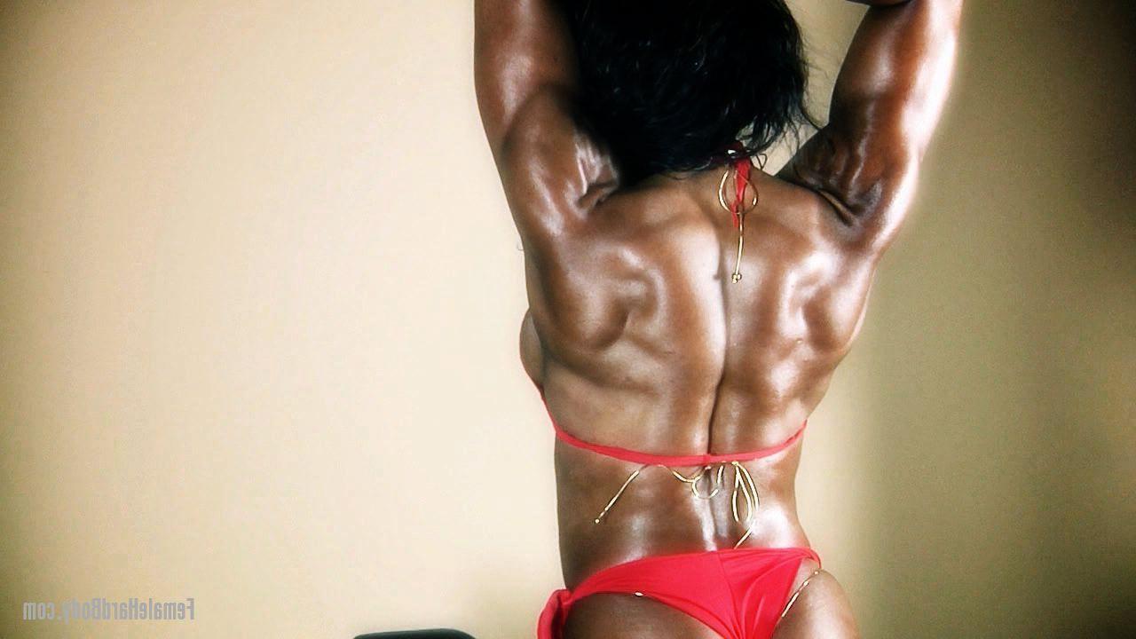 20P Chesty bodybuilder Alexis Ellis flexing her big muscles in a skimpy red bikini