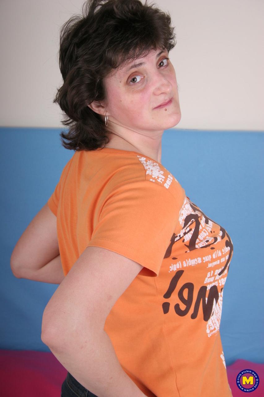 20P Amateur European Melita rubbing and toying her mature beaver on the bed