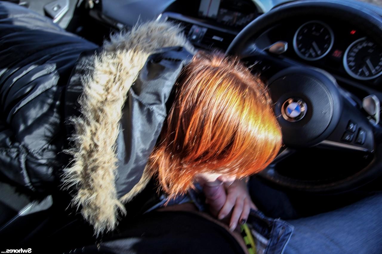 20P Naughty redhead unveils her tiny tits while giving a stranger a blowjob