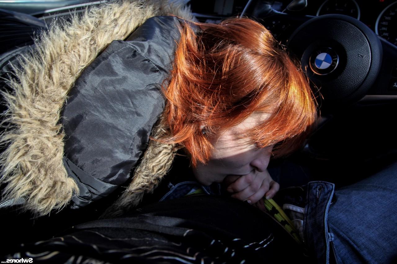 20P Naughty redhead unveils her tiny tits while giving a stranger a blowjob