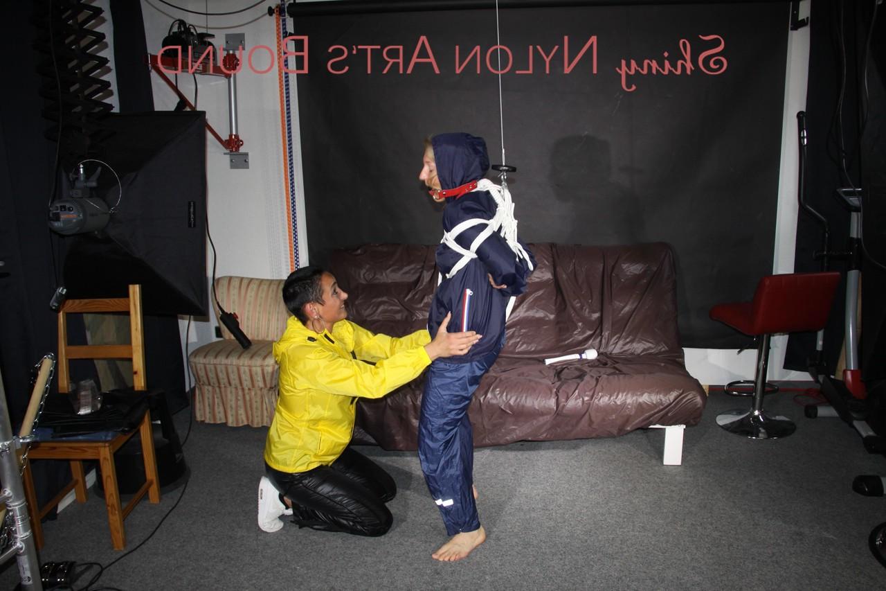 16P Submissive girl receives a kiss while restrained by her lesbian lover