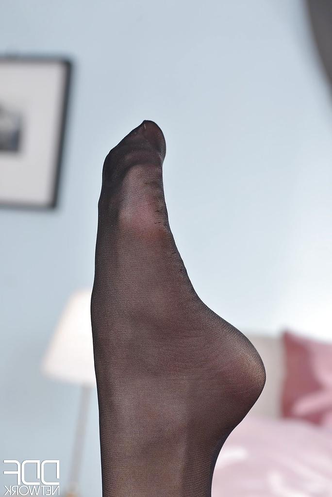 16P Lingerie model Brookie G. is revealing her slim legs in close up