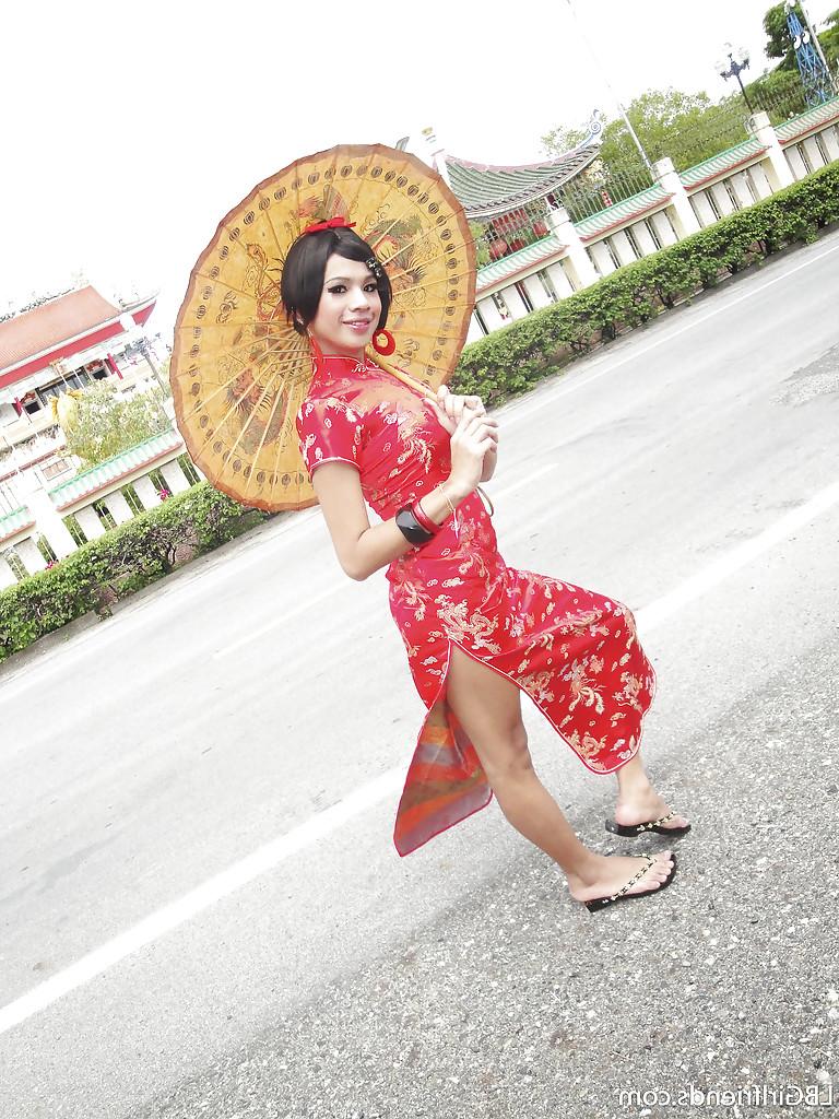 16P Cute Thai tranny Eark spreading in high heels and showing off her cock