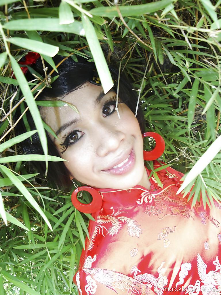 16P Cute Thai tranny Eark spreading in high heels and showing off her cock
