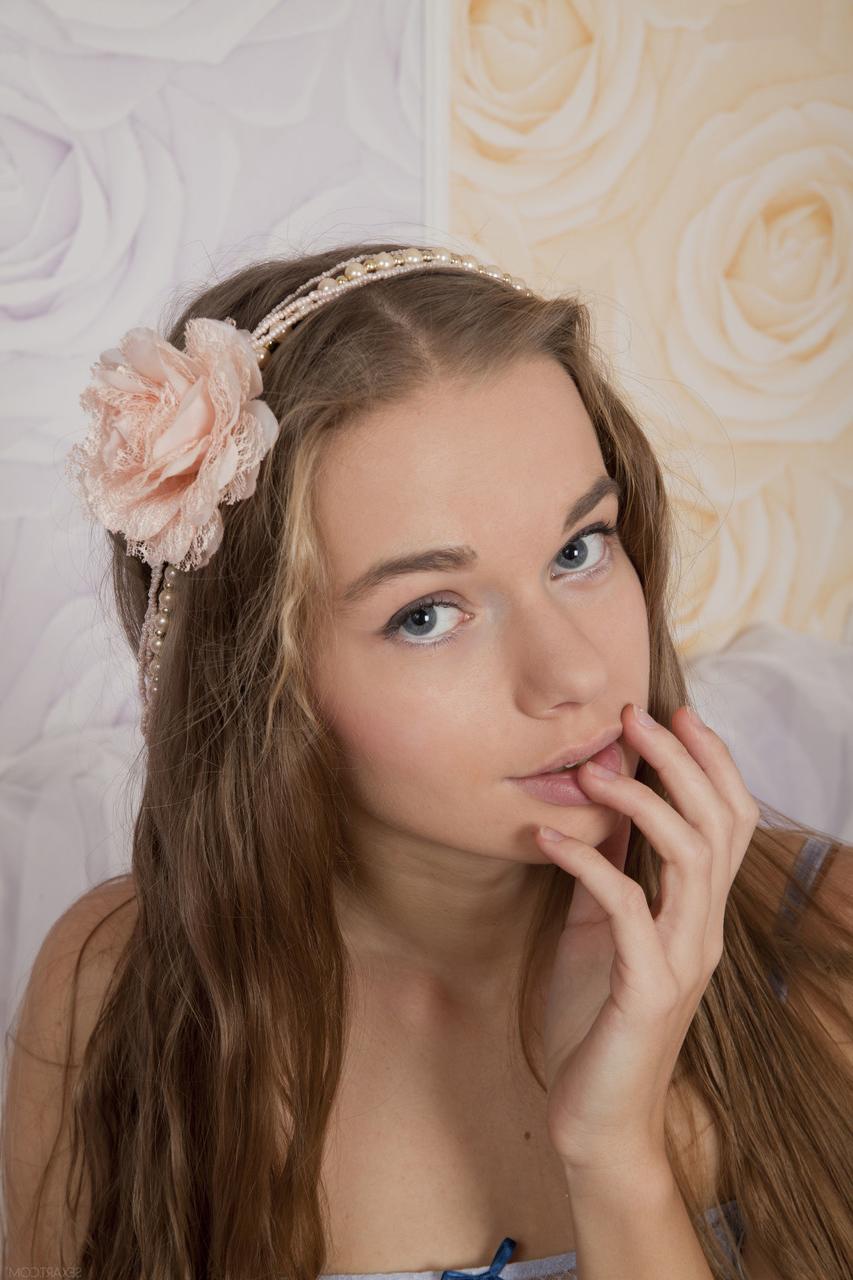 20P Gorgeous Russian Milena D undresses and rubs her hairy pussy and big ass
